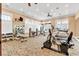 Well-equipped fitness center with modern equipment, mirrors, and windows at 359 Woodridge Pass, Canton, GA 30114
