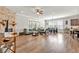 Open concept living room with hardwood floors and fireplace at 359 Woodridge Pass, Canton, GA 30114