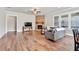Living room with a brick fireplace and hardwood floors at 359 Woodridge Pass, Canton, GA 30114