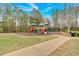 Community playground with slides and swings surrounded by lush green space and walking path at 359 Woodridge Pass, Canton, GA 30114