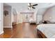 Spacious bedroom with wood floors, natural light, ceiling fan, and two beds at 3965 Hamilton View Way, Dacula, GA 30019