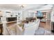 Bright and airy living room flows into the kitchen creating an open and inviting space at 3965 Hamilton View Way, Dacula, GA 30019