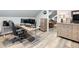 Bonus room with wood floors, setup as an office, with natural light at 3965 Hamilton View Way, Dacula, GA 30019