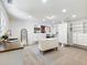 Large walk-in closet featuring custom shelving, drawers, carpeted floors and a vanity area at 3965 Hamilton View Way, Dacula, GA 30019