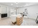 Spacious walk-in closet with carpeted floors, custom shelving, and vanity with a sink at 3965 Hamilton View Way, Dacula, GA 30019