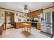Functional kitchen featuring stainless steel appliances and ample counter space at 5269 Blue Grass Ln, Sugar Hill, GA 30518