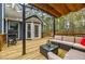 Outdoor deck area is furnished with cushioned patio furniture at 7660 Brentwood Ct, Cumming, GA 30040