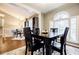Dining room featuring natural light and hardwood floors at 7660 Brentwood Ct, Cumming, GA 30040