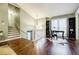 Bright and airy office space with wood floors, natural light, and a modern desk at 7660 Brentwood Ct, Cumming, GA 30040