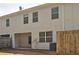 Rear exterior of the home, featuring a fenced yard and patio area at 234 Madison Ave, Acworth, GA 30102