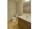 Bathroom featuring neutral tile, large mirror and vanity at 234 Madison Ave, Acworth, GA 30102