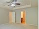 Carpeted bedroom features ceiling detail and ensuite access at 234 Madison Ave, Acworth, GA 30102