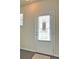 Interior view of a white paneled entry door with window panes and interior blinds at 234 Madison Ave, Acworth, GA 30102