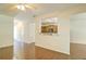 Open-concept layout with hardwood floors, kitchen pass-through, and natural light at 234 Madison Ave, Acworth, GA 30102