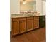 Kitchen area featuring granite counters and stainless dishwasher at 234 Madison Ave, Acworth, GA 30102