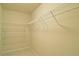 Spacious walk-in closet with ample shelving, ideal for organization and storage at 234 Madison Ave, Acworth, GA 30102