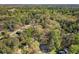 Aerial view of property near Bunten Road Park, surrounded by lush greenery and mature trees at 3378 Peachtree Chase, Duluth, GA 30096
