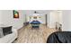 Large game room with a pool table and adjacent lounge area for versatile entertainment at 3378 Peachtree Chase, Duluth, GA 30096