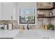 Bright and airy kitchen sink with natural light and stylish decor at 3378 Peachtree Chase, Duluth, GA 30096