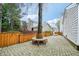 This lovely backyard features a brick patio, a round bench surrounding a tree at 3800 Lake Pass Ln, Suwanee, GA 30024