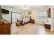 Bright bedroom featuring hardwood floors, neutral tones, and a comfortable bed with stylish decor at 3800 Lake Pass Ln, Suwanee, GA 30024