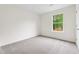 Spacious bedroom with a window bringing in plenty of natural light at 5615 Crystal Hl, Stone Mountain, GA 30088