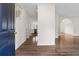Inviting entryway with hardwood floors and view into kitchen and living areas at 5615 Crystal Hl, Stone Mountain, GA 30088