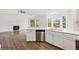 Kitchen with modern cabinets, stainless appliances and hardwood flooring at 5615 Crystal Hl, Stone Mountain, GA 30088