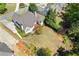 Aerial view of a house featuring an outdoor deck, and a spacious backyard at 5055 Stefan Ridge Way, Buford, GA 30519