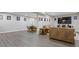 Finished basement with a seating area at 5055 Stefan Ridge Way, Buford, GA 30519