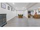 Finished basement with seating area and table at 5055 Stefan Ridge Way, Buford, GA 30519