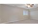 Bedroom with neutral walls, trim, and carpet at 5055 Stefan Ridge Way, Buford, GA 30519