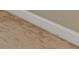Textured brown tile with white baseboard at 5055 Stefan Ridge Way, Buford, GA 30519