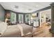 Inviting bedroom with a comfortable bed and natural light at 2305 Stonevalley Ct, Cumming, GA 30041
