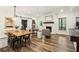Inviting dining room with wood table and fireplace at 2305 Stonevalley Ct, Cumming, GA 30041