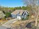 Charming home with a basketball hoop, landscaped yard, and a well-maintained lawn at 2305 Stonevalley Ct, Cumming, GA 30041