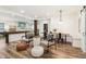Open-concept living area with seating and natural light at 2305 Stonevalley Ct, Cumming, GA 30041