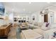 Spacious living room with a large sectional sofa and modern decor at 2305 Stonevalley Ct, Cumming, GA 30041