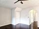 Inviting room with neutral walls, ceiling fan, and dark hardwood floors at 801 Old Peachtree Nw Rd # 15, Lawrenceville, GA 30043