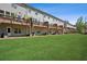 Townhome backyard offers a large grassy space and outdoor decks at 2048 Violet Lane, Brookhaven, GA 30319