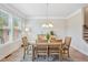 Cozy dining room with hardwood floors and a chandelier at 2048 Violet Lane, Brookhaven, GA 30319