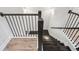 Modern staircase with wooden steps and black iron railings at 2048 Violet Lane, Brookhaven, GA 30319