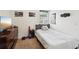 A furnished bedroom with a bed, dresser, and decor, designed for a relaxing atmosphere at 2051 Wildflower Way, Conyers, GA 30012
