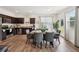 Contemporary kitchen featuring stainless steel appliances, granite countertops, and ample cabinet space at 2051 Wildflower Way, Conyers, GA 30012