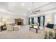 Spacious living room with a fireplace, carpet, and ceiling fan at 434 Meadowfield Ct, Lawrenceville, GA 30043