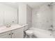 Bright bathroom with a shower-tub combo and modern fixtures at 831 Mercury Nw Dr, Atlanta, GA 30331