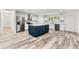 Open concept kitchen features stainless steel appliances and a large center island at 831 Mercury Nw Dr, Atlanta, GA 30331