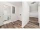 Well-lit laundry room with washer hookup and space for storage at 831 Mercury Nw Dr, Atlanta, GA 30331