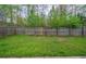 This property has a green backyard with a wooden fence at 2899 Duncan Pl, Decatur, GA 30034