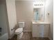 This bathroom has a vanity, mirror, toilet and bath at 2899 Duncan Pl, Decatur, GA 30034